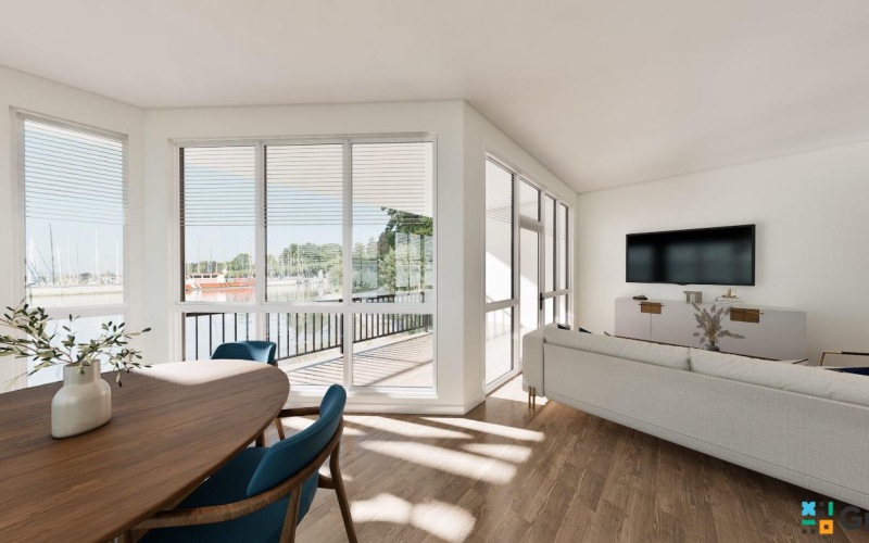 Living and Dining with large windows on the harbor