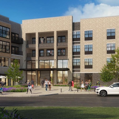 Settle into comfort at The August a group of people walking outside of a building