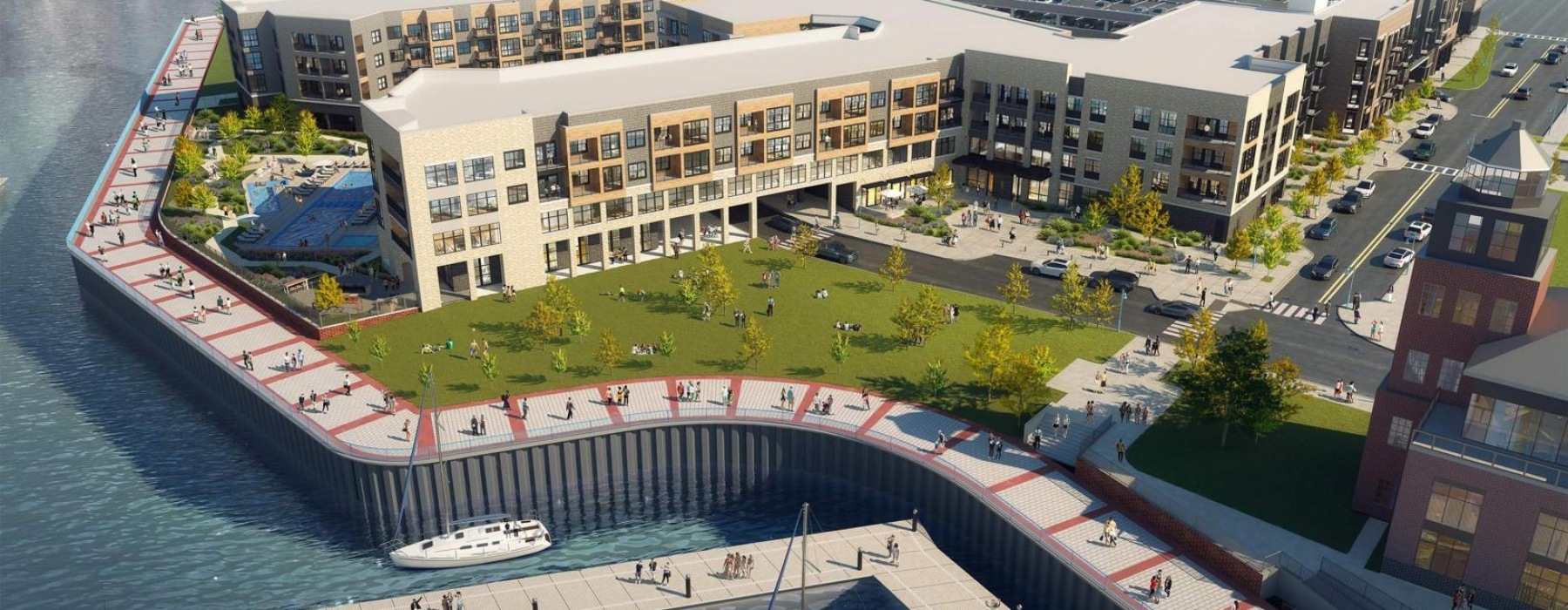 a building with a lake and boats in front of it
